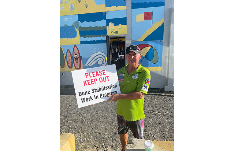 David Lau keeps a weather eye upon beach access and building maintenance.