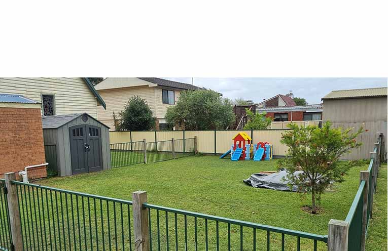 The fenced-in area out the back of St Columba’s will be home to the new play equipment. Photo: Thomas O’Keefe.
