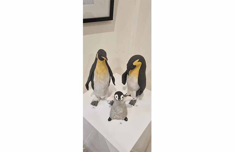 Chez’s family of emperor penguins show a playful side to life. Photo: Thomas O’Keefe.