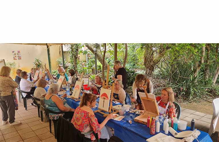 A full table of painters took up the challenge. Photo: Thomas O’Keefe.