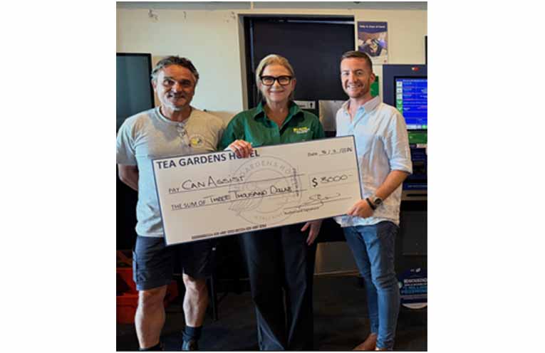 Trevor and Warren with Magellan from Can Assist. Photo: TG Hotel.