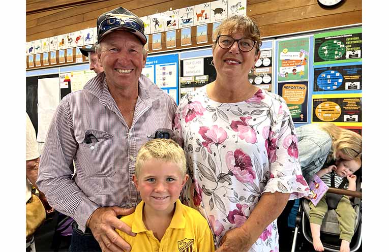 Mason in Kindergarten with his grandparents.