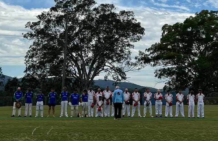 The teams held a minute’s silence for fallen cricketer Ben Austin. Photo: Bowen Betts.