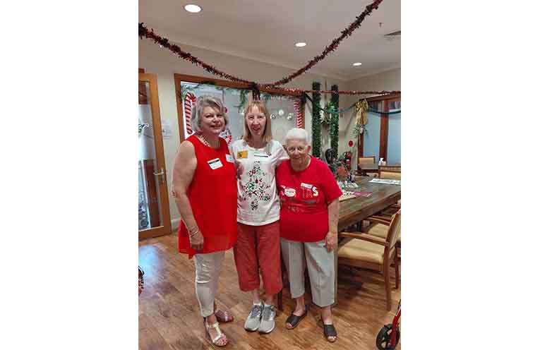 Karen and Ros from Myall U3A with Estia volunteer Pat. Photo: Ros Jones.