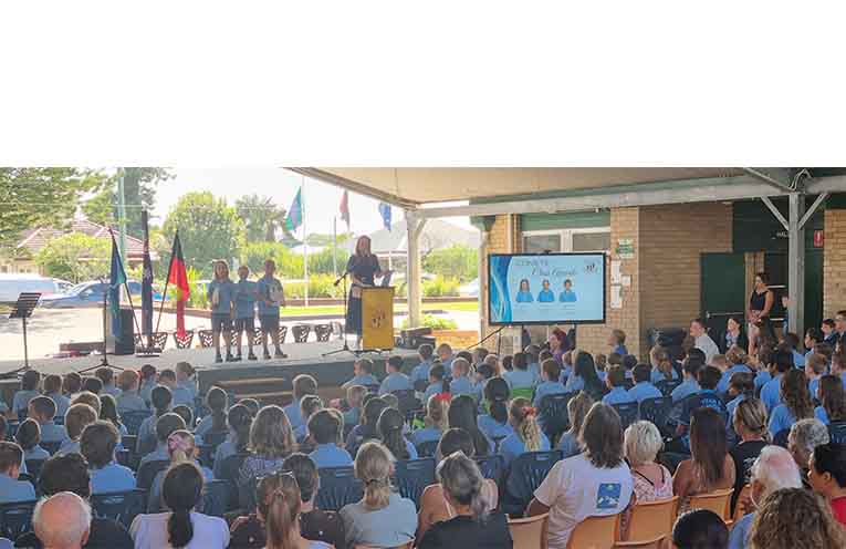 A large gathering of family and supporters under the COLA at Tea Gardens PS to celebrate a year of achievements. Photo: Thomas O’Keefe.