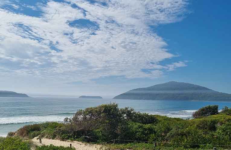 Atmospheric inversion causes thick smoke to linger over Myall Coast