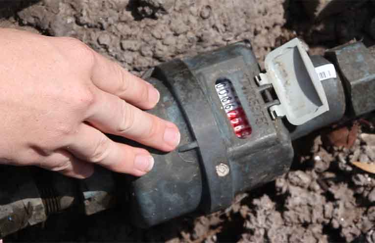 Maintaining clear access to water meters