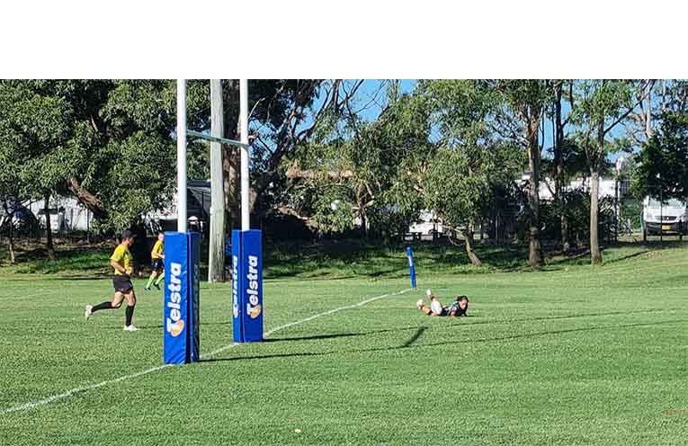 Litiana ran most of the field before scoring the third Lady Hawks’ try. Photo: Thomas O’Keefe.