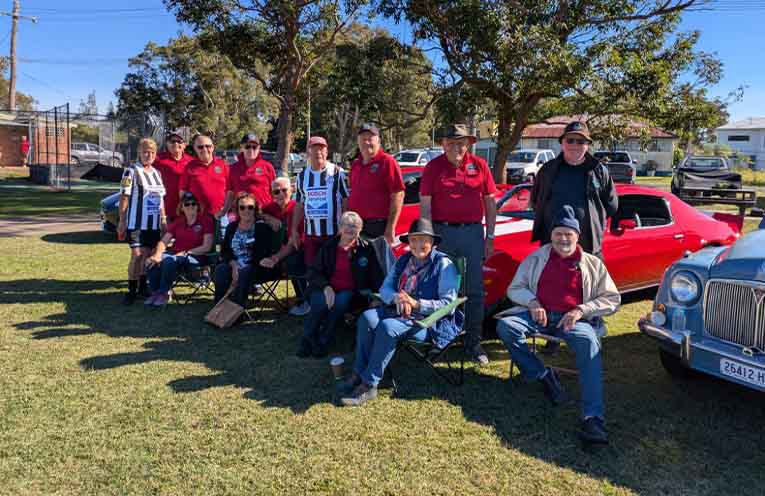 Game day sponsors from the Myall Motor Club with referees George and Karen.