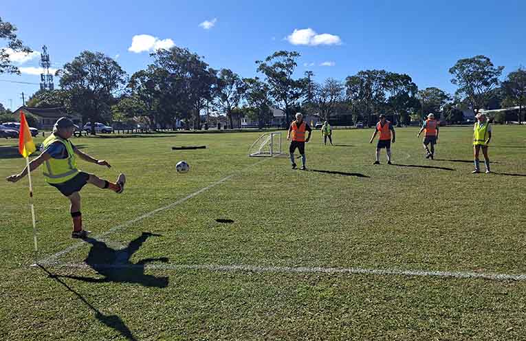 DK letting fly with a corner kick.