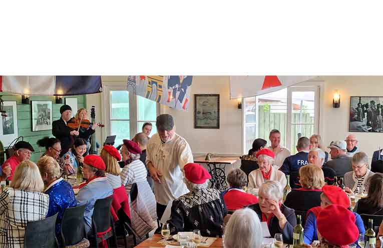 Tillerman’s Peter Hodges answers questions posed by Francophiles at the feast. Photo: Thomas O’Keefe.