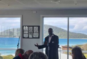 Henry Olonga speaks and sings at Surf Club event