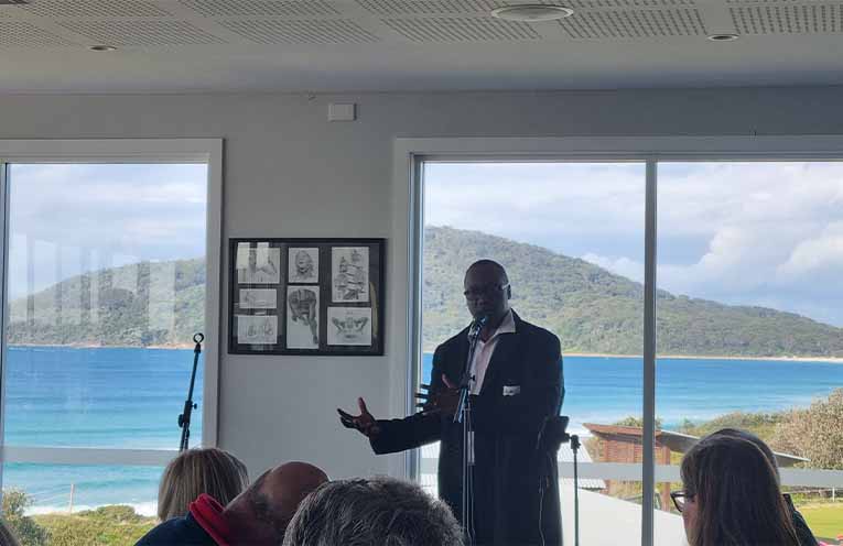 Henry Olonga speaks and sings at Surf Club event
