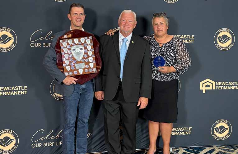 Winner of the Surf Life Saver of the Year award, Wayne Bower, with Hunter SLS president Henry Scruton and TGHN SLSC president Rebecca Curtis, who received the Hunter SLS President’s Award. Photo: Supplied.