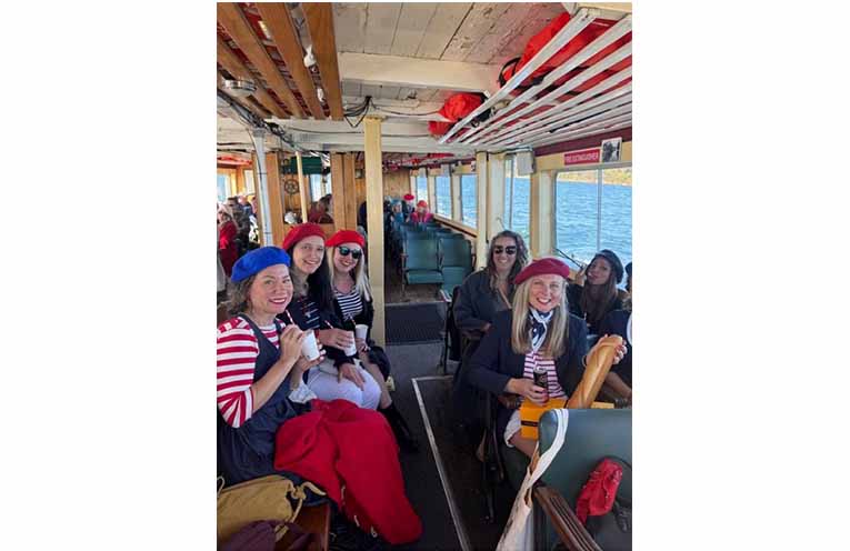 Ferry passengers in French-themed outfits on a recent ride to Tillermans restaurant for a Bastille Day long lunch. Photo: The Original Tea Gardens Ferry.