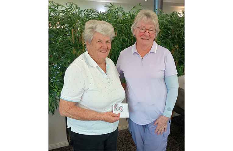 Lorraine Bragg is presented with her special VWGA badge by Jo Buttrey.