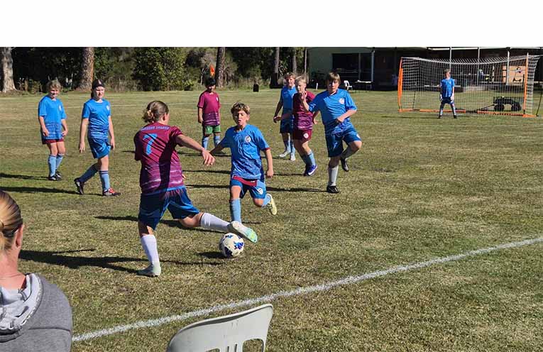 Lucca about to navigate around the opposition.