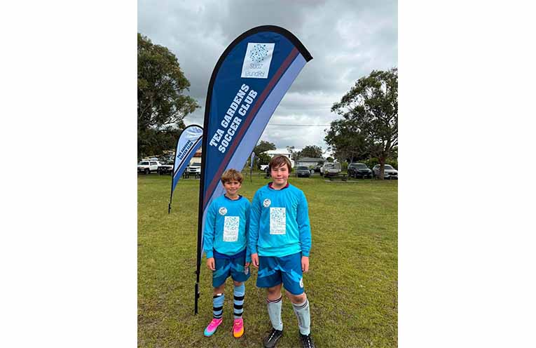 Suds Laundry’s game day co-sponsor team members Tobias and Reef.