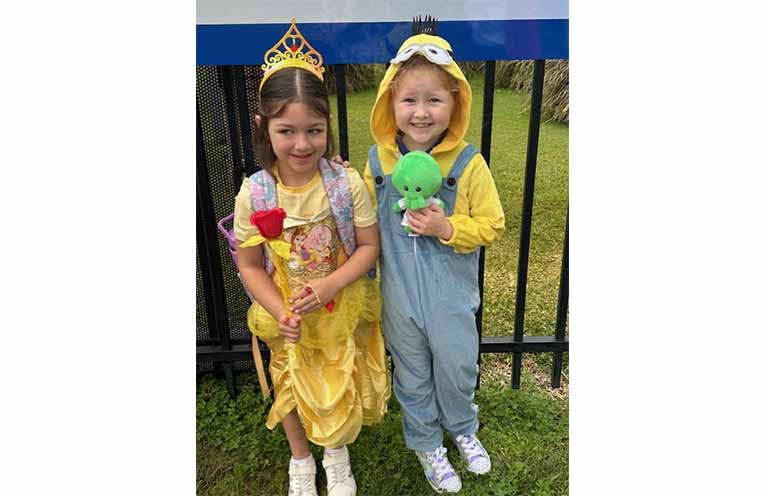 Amara and Layla enjoy the Book Week celebrations. Photo: Althea Guinsberg.