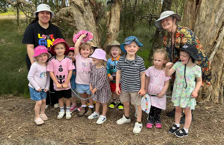 TGHN Preschool Group, from left: Educator - Charli, the original pint-sized protesters and Supervisor - Judy Clarke. Photo: Supplied by Judy Clarke.