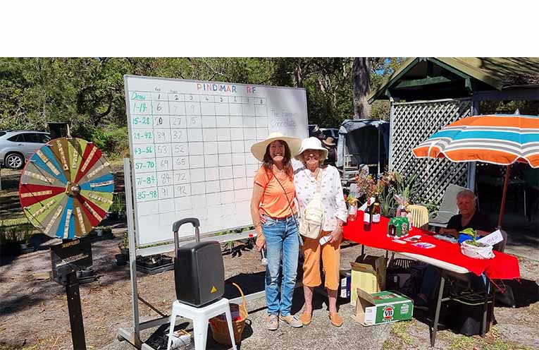 Lesley and Bea handed out prizes at the Chocolate Wheel. Photo: Thomas O’Keefe.