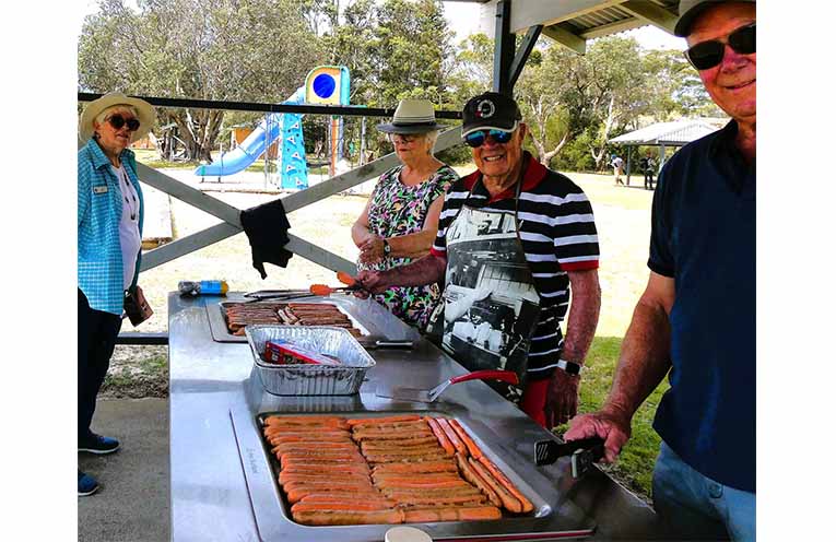 Sausages and more sausages at the anniversary barbecue in Winda Woppa. Photo: Hugh Ross.