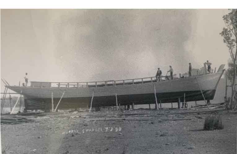 The Phil Forbes undergoing repairs on Witt Island. Photo: Anne Johnson.